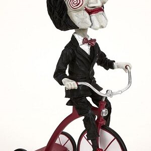 SAW PUPPET ON TRICYCLE HEADKNOCKER